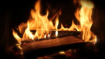 wood burning in fireplace.