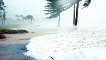 Hurricane making landfall with high winds.